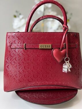 GUESS Jerica Cabernet  Embossed Logo Satchel with Heart Charm